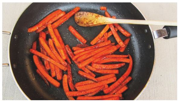 Glazed carrots in pan