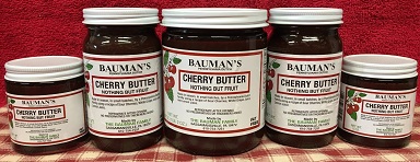 A picture of several jars of Bauman's cherry butter