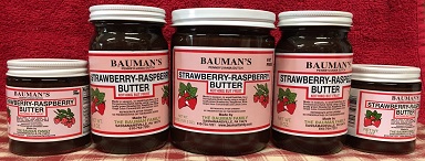 A picture of several jars of Bauman's strawberry raspberry butter