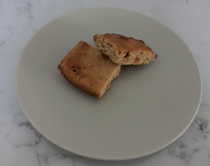 2 apple cider blondies on a plate