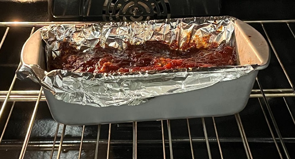 Meatloaf topped with tomato butter